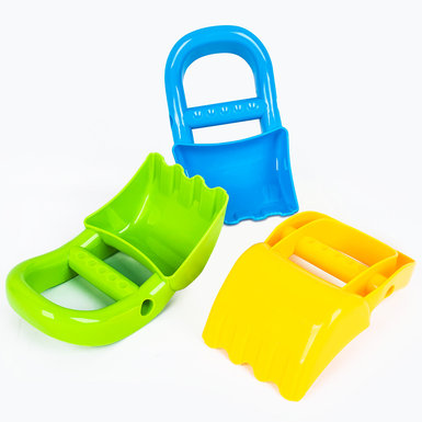 The sand digger holds the beach toy