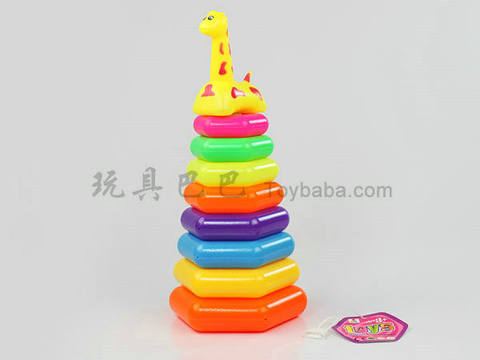 Tower shaped giraffe in ring