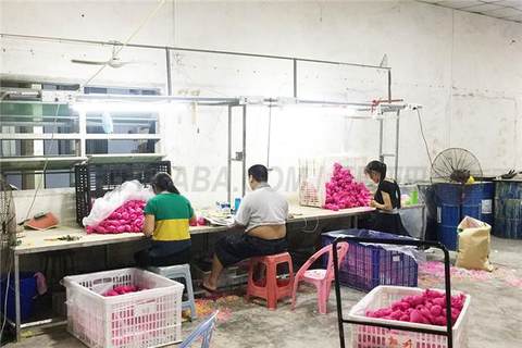 Post-assembly workshop of rubber-lined toy processing factory