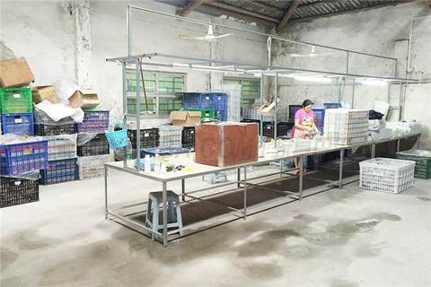 Post-assembly workshop of rubber-lined toy processing factory