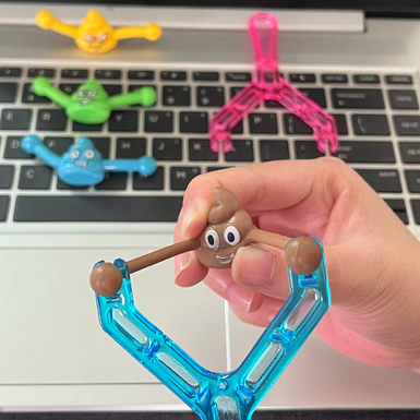 Poop slingshot novel toy