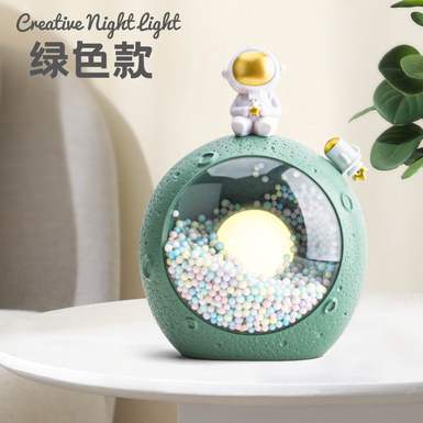Lunar microscopic charging nightlight (yellow, orange, green)